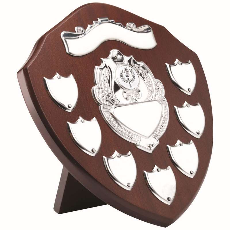 MAHOGANY SHIELD WITH CHROME FRONT AND 7 RECORD SHIELDS (1in CENTRE) – 9in